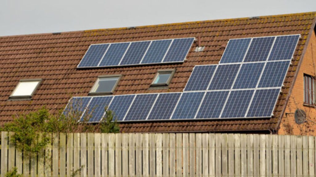 A domestic household with solar panels installed on the roof