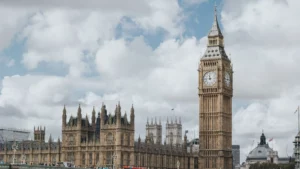 Photo of the Houses of Parliament in Westminster, London, on a cloudy day